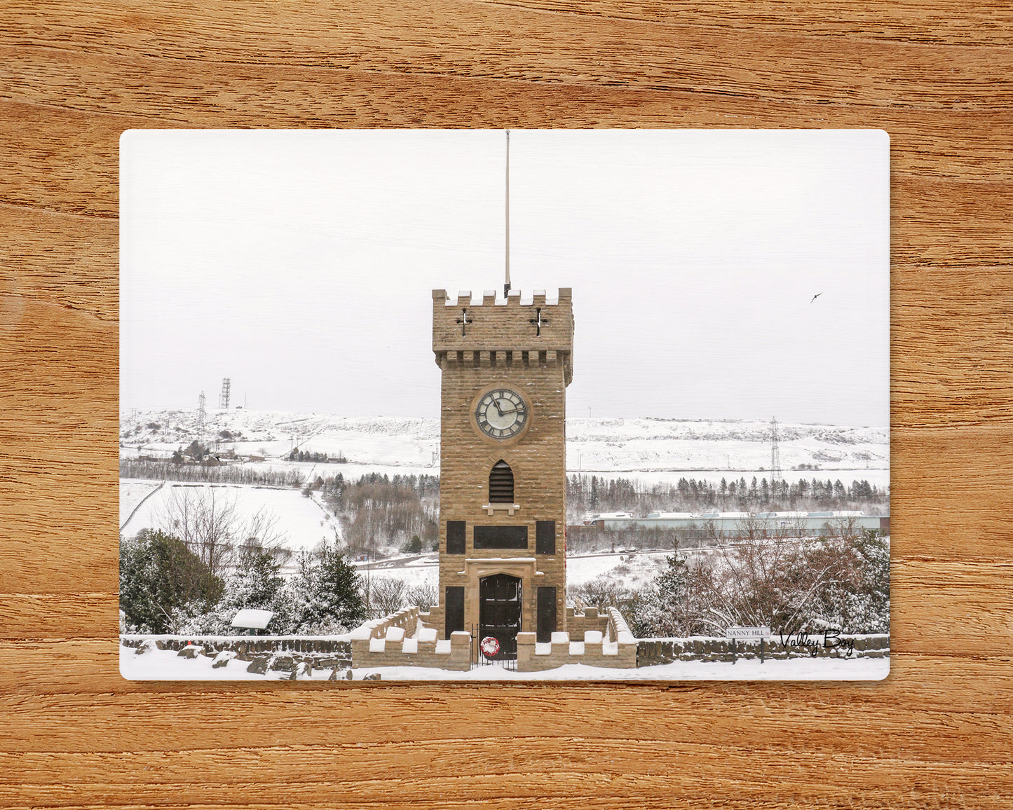 "Snow at the Clock Tower in Stocksbridge” Glass Worktop Saver